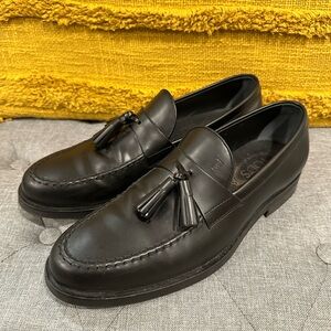 Tod's black leather loafers. New